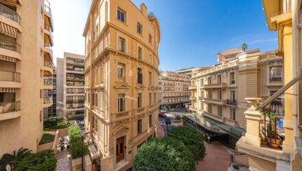 Residential façades of Monaco above Port Hercule, the Monegasque property market in 2026