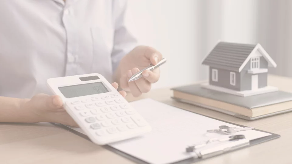 Mortgage registration form and keys to an apartment in Monaco, illustrating the mortgage fees payable on a financed property purchase